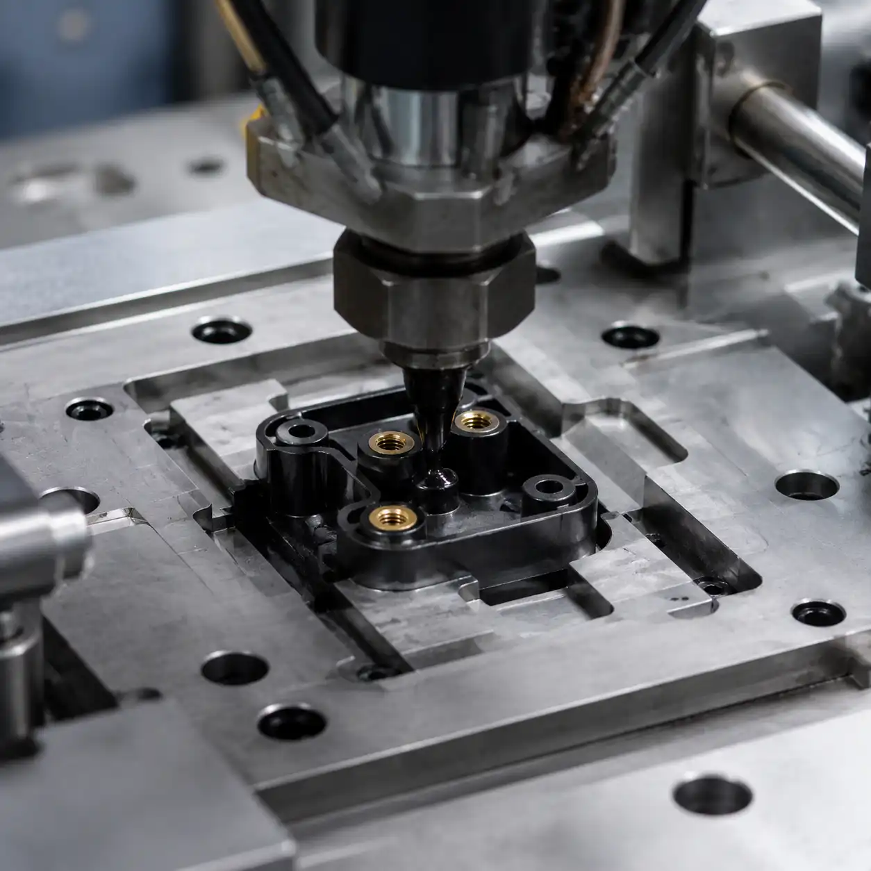 Insert Molding: Complete Guide to Process, Design and Applications Insert molding process: metal insert overmolded with engineering plastic