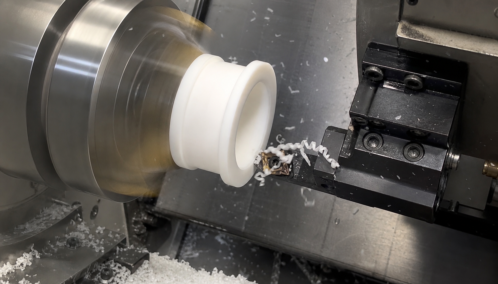 Precision turning of custom plastic bushings with controlled bore, flange and wall thickness