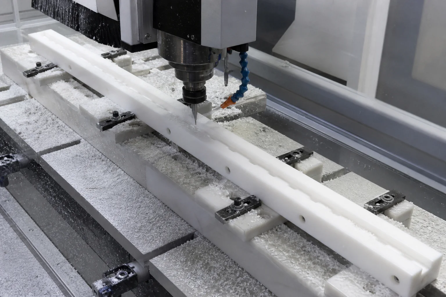 Plastic Chain Guides Manufacturer: Profiles, Materials and RFQ Guide CNC routing a long white UHMW plastic chain guide channel and mounting features